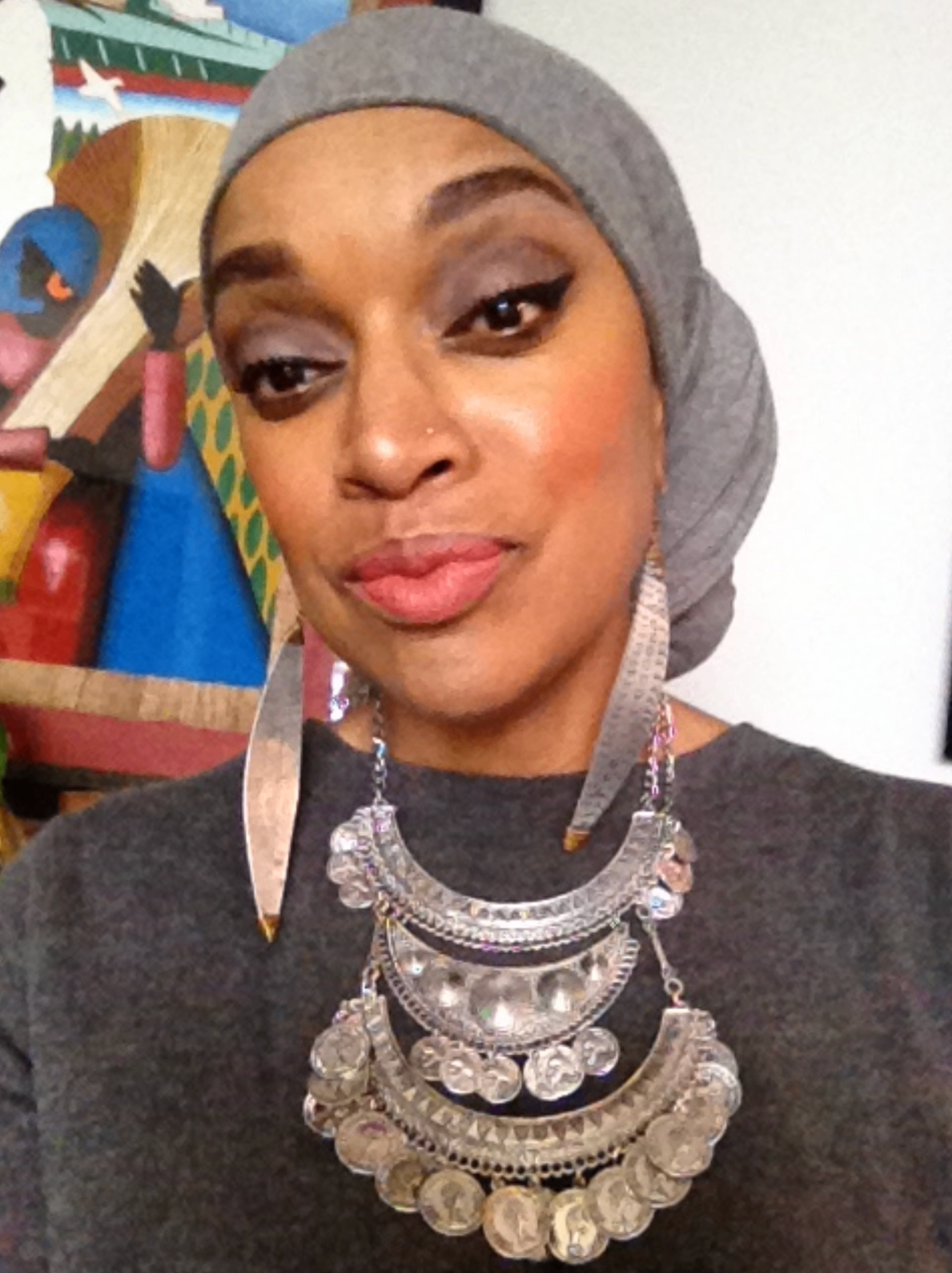 Akanke in a silver-gray hijab