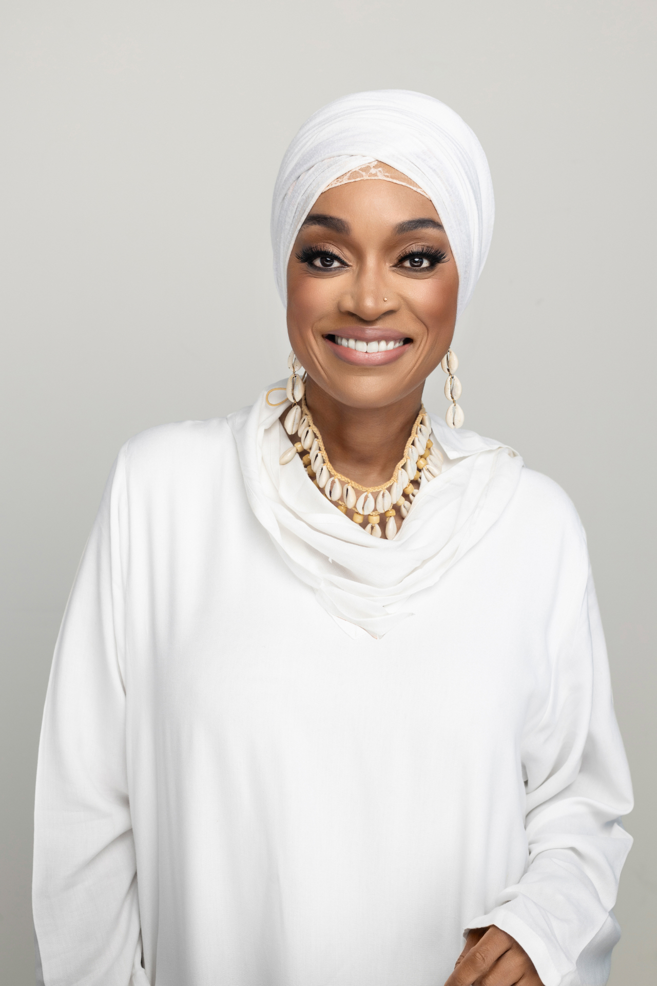 Akanke Rasheed, smiling warmly